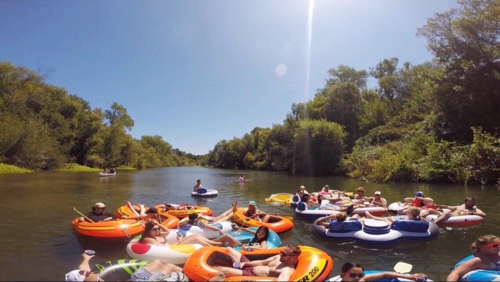 tourist floats in river