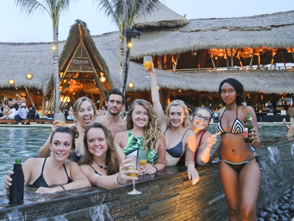 tourists in swimsuit