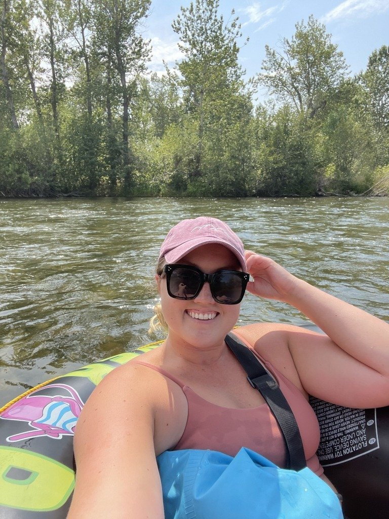 woman floating in the river in Boise
