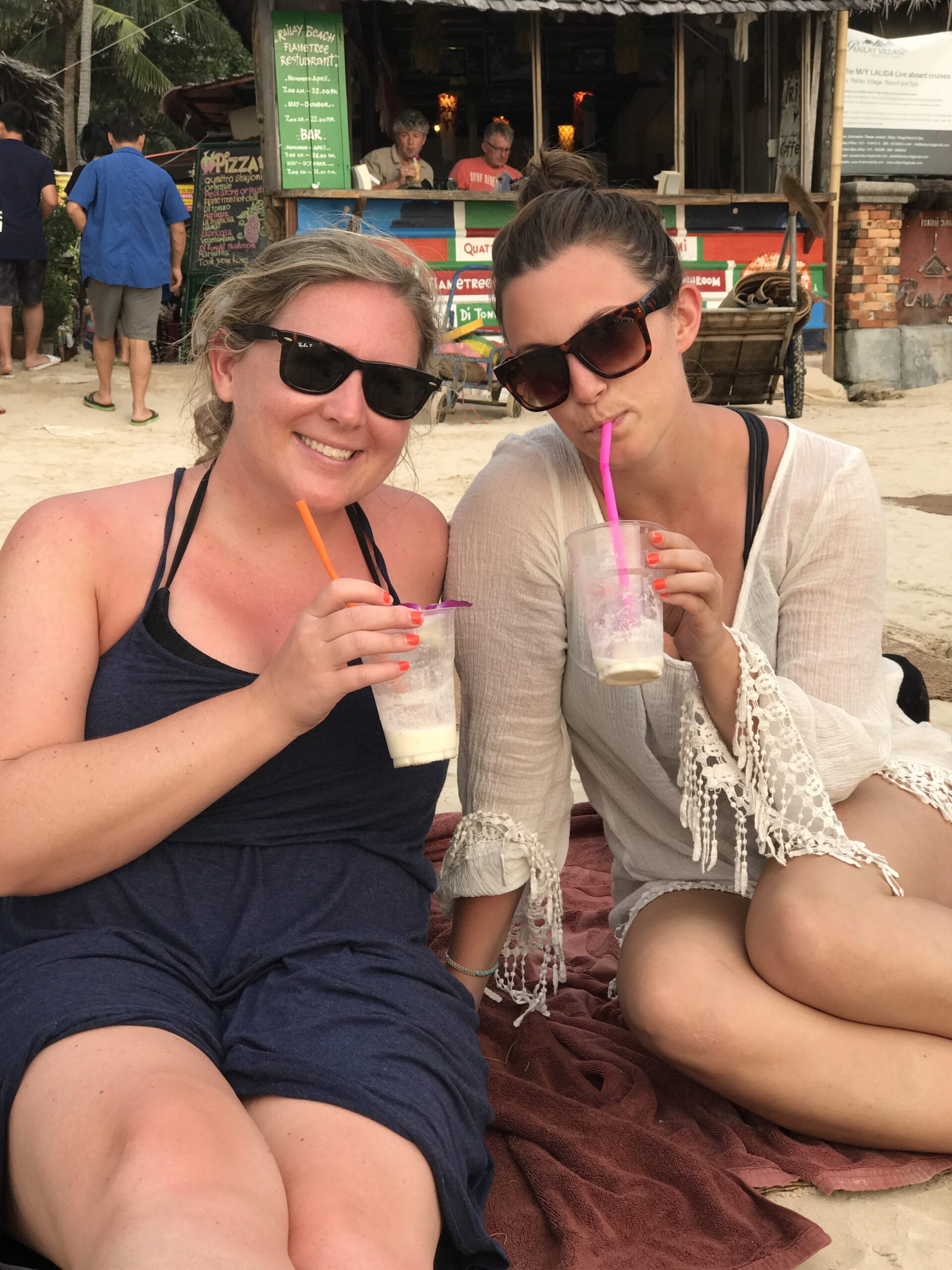 drinking juice in Thailand beach