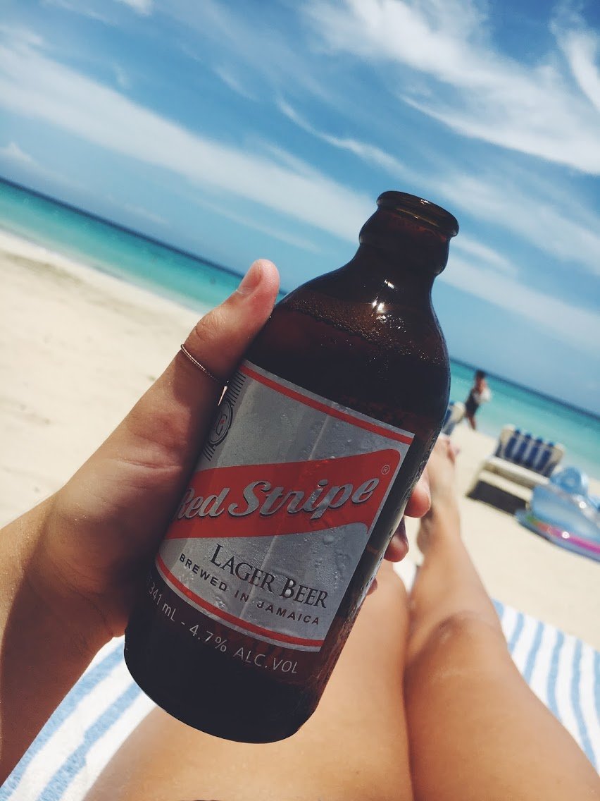 Red Stripe beer at the beach Red Stripe beer at the beach
